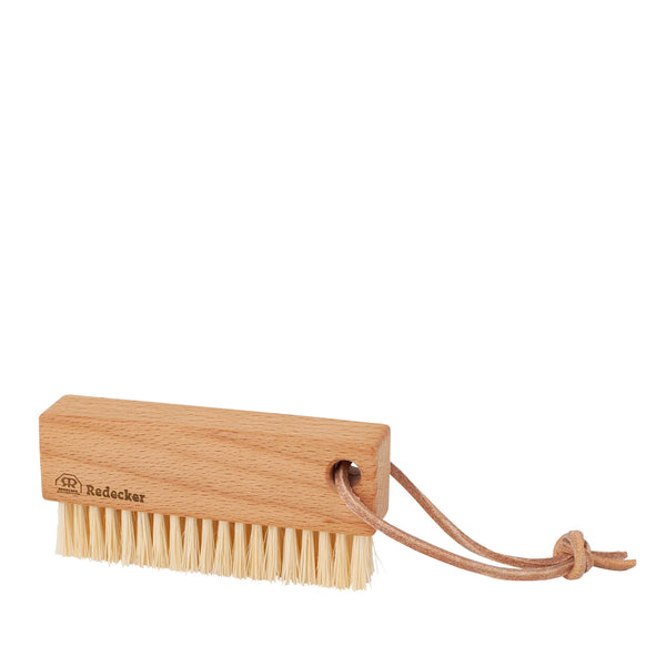 Wooden brush with bristles on a white background