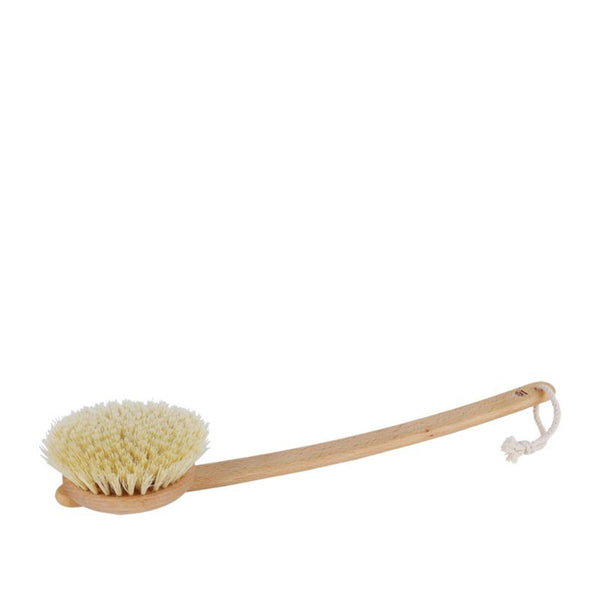 Bare skin body brush with natural bristles on a white background