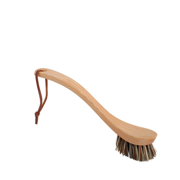 Wooden brush with bristles on a white background
