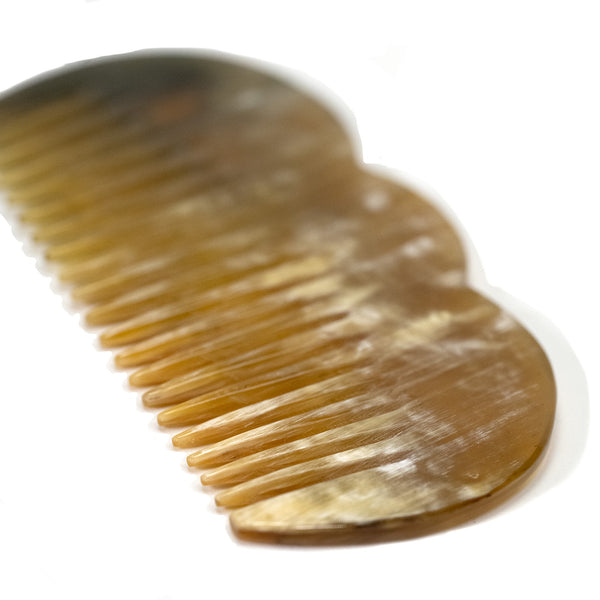 horn-comb-brown-close-up