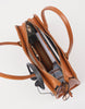 Inside of the cognac suede laptop work bag