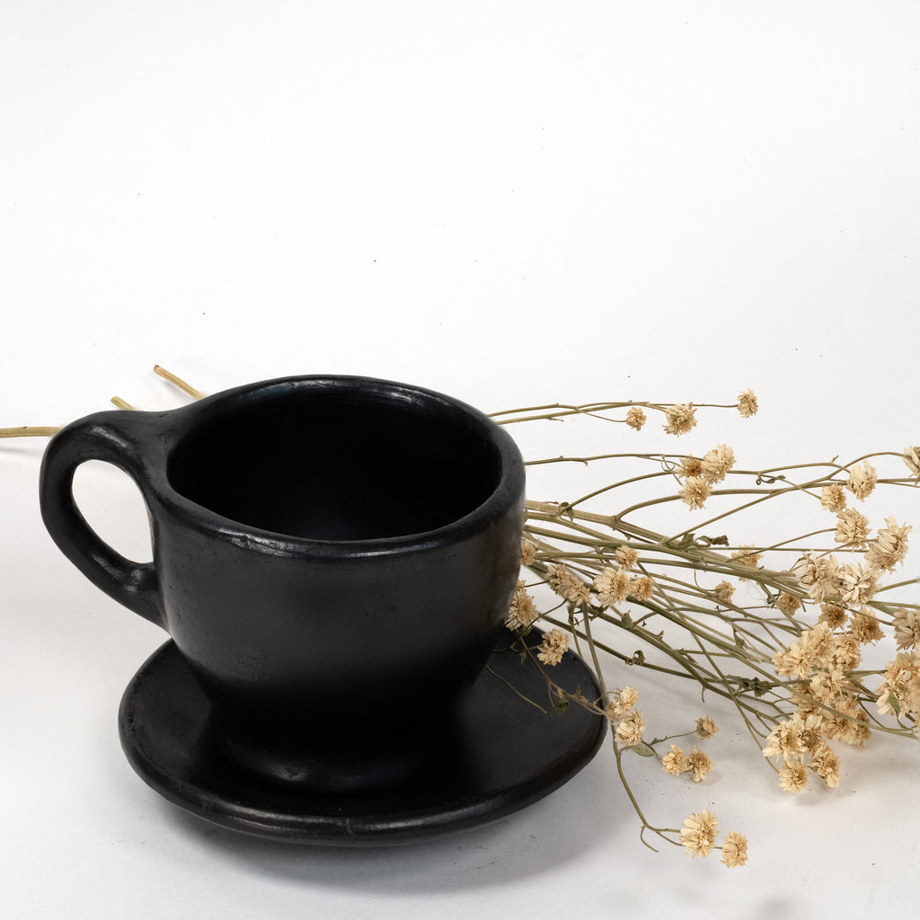 black-clay-mug-with-flowers