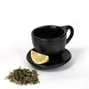 black-clay-mug-with-tea-and-lemon